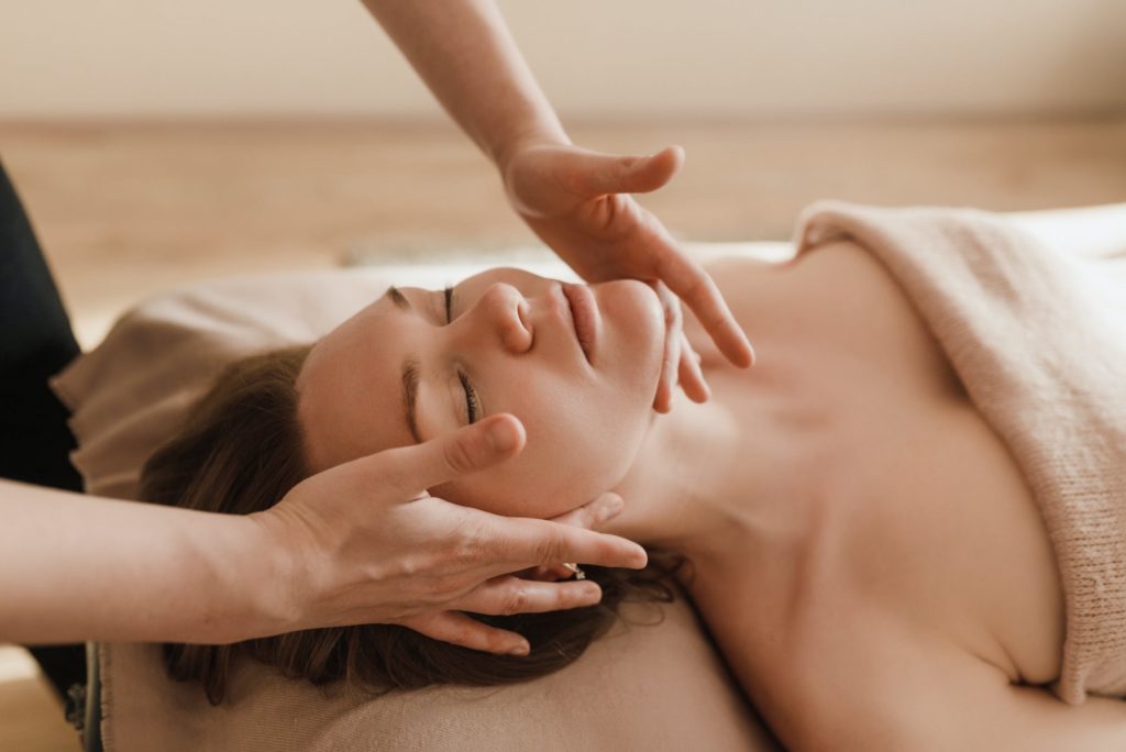 What's The Difference Between Massage Services And Massage Guns? | massage | London Mobile Massage london mobile massage woman receiving massage blog feature image massage